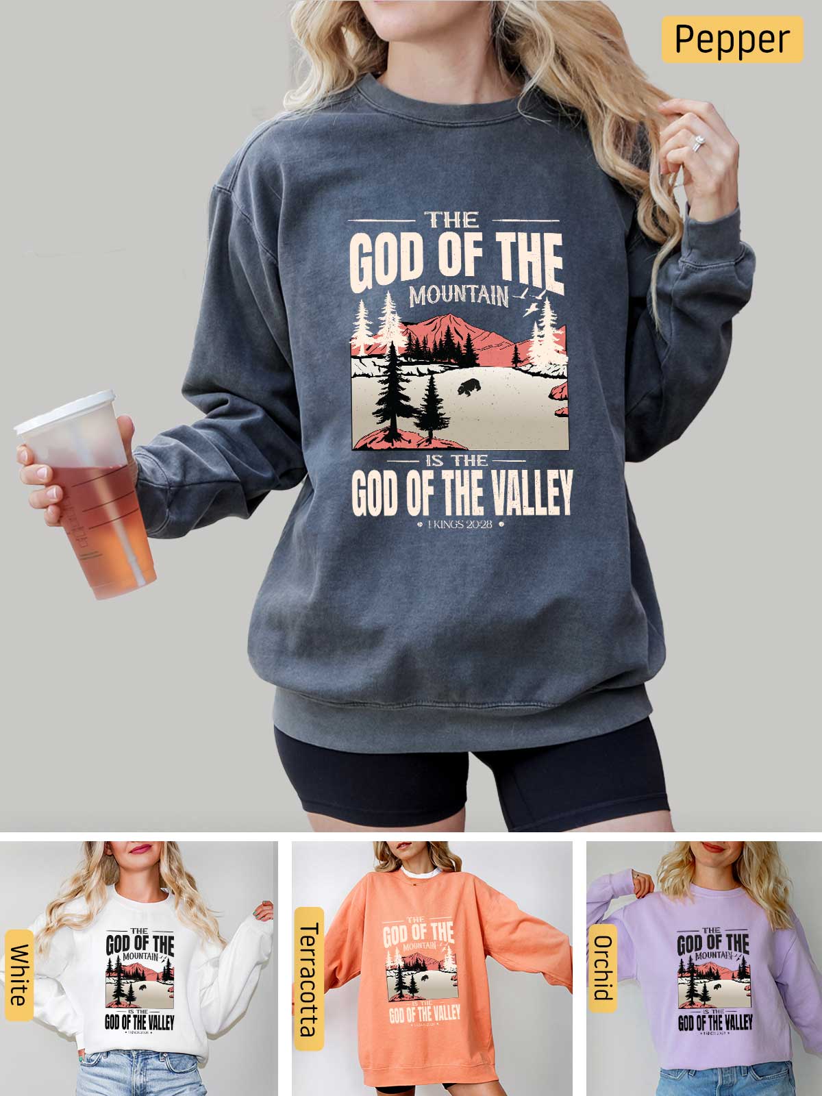 a woman wearing a sweatshirt with the words god of the mountain on it