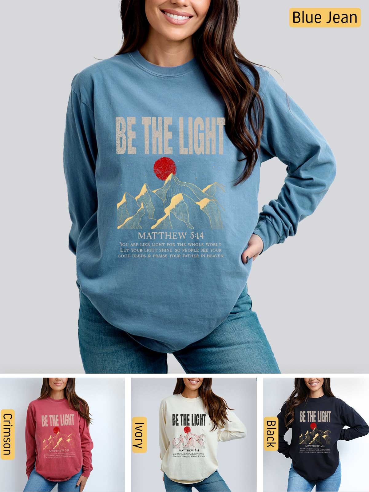 a woman wearing a blue sweatshirt with the words be the light on it