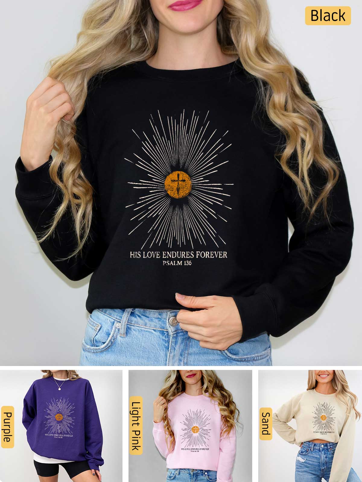 a woman wearing a black sweatshirt with a sun graphic on it