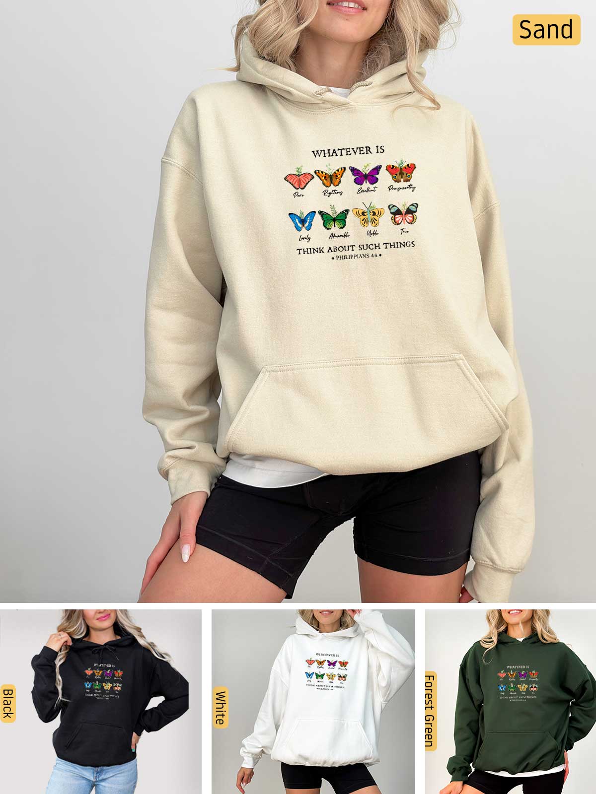 a woman wearing a sweatshirt with butterflies on it