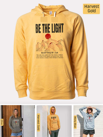 a yellow hoodie with a picture of a woman with a rose on it