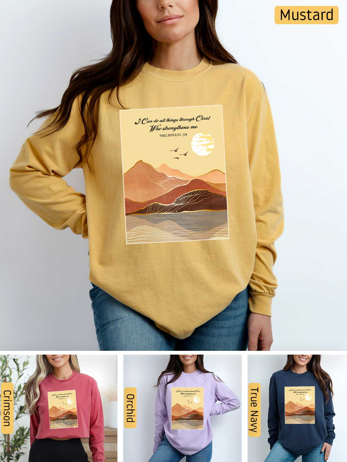 a woman wearing a mustard colored sweatshirt with mountains on it