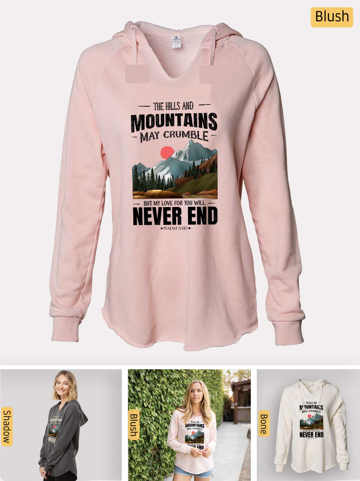 a pink hoodie with a picture of mountains and trees on it