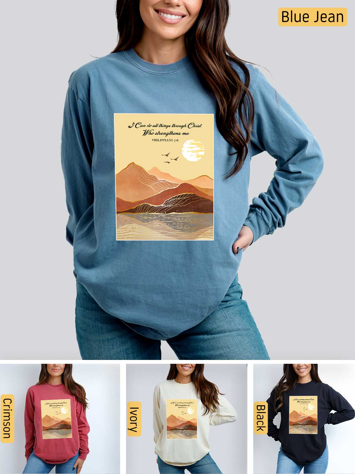 a woman wearing a blue sweatshirt with a picture of mountains on it