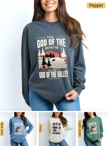 a woman wearing a sweatshirt that says god of the mountains