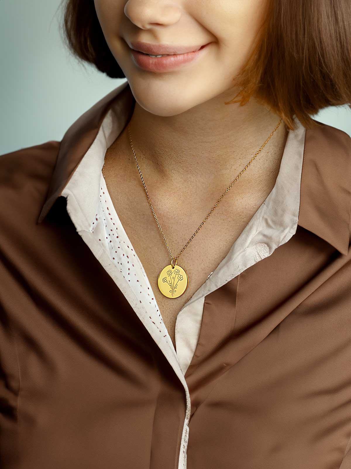 a close up of a person wearing a necklace