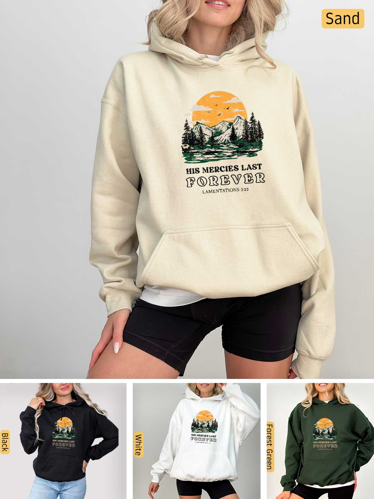 a woman wearing a hoodie with a sunset on it