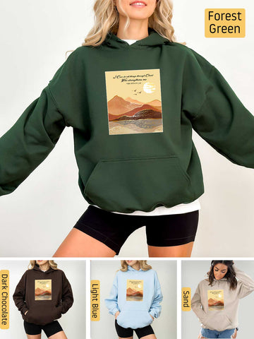 a woman wearing a green hoodie with a picture of a mountain