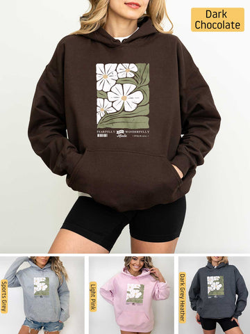 a woman wearing a hoodie with flowers on it