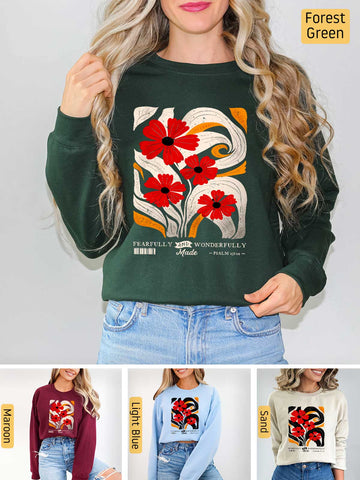 a woman wearing a green sweater with red flowers on it