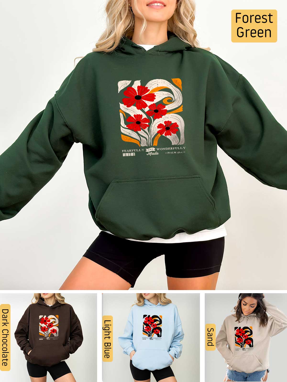 a woman wearing a green hoodie with red flowers on it