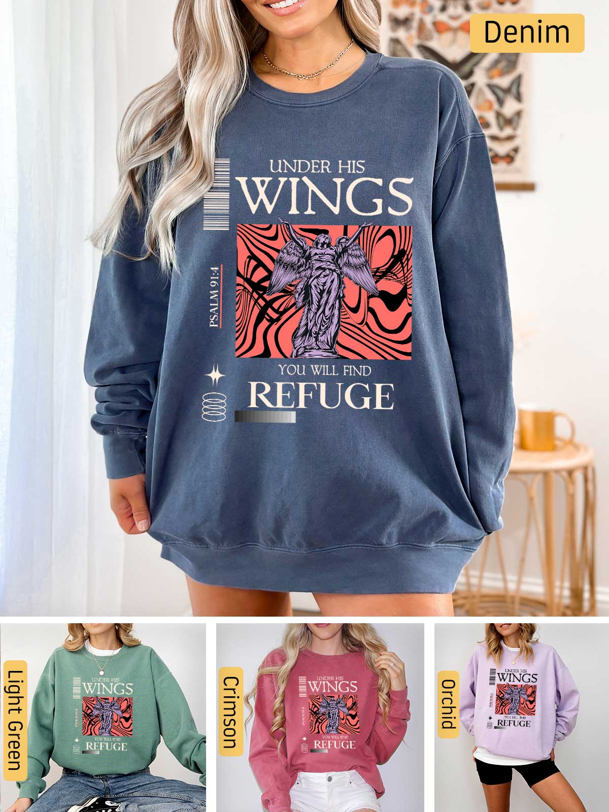 a woman wearing a sweatshirt with wings on it