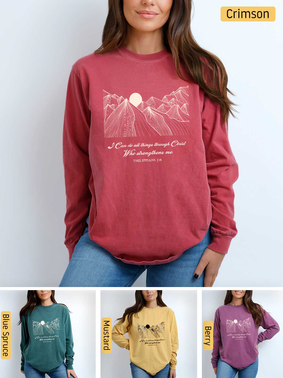 a woman wearing a red sweatshirt with a mountain scene on it
