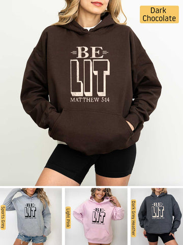 a woman wearing a hoodie with the words be lit on it