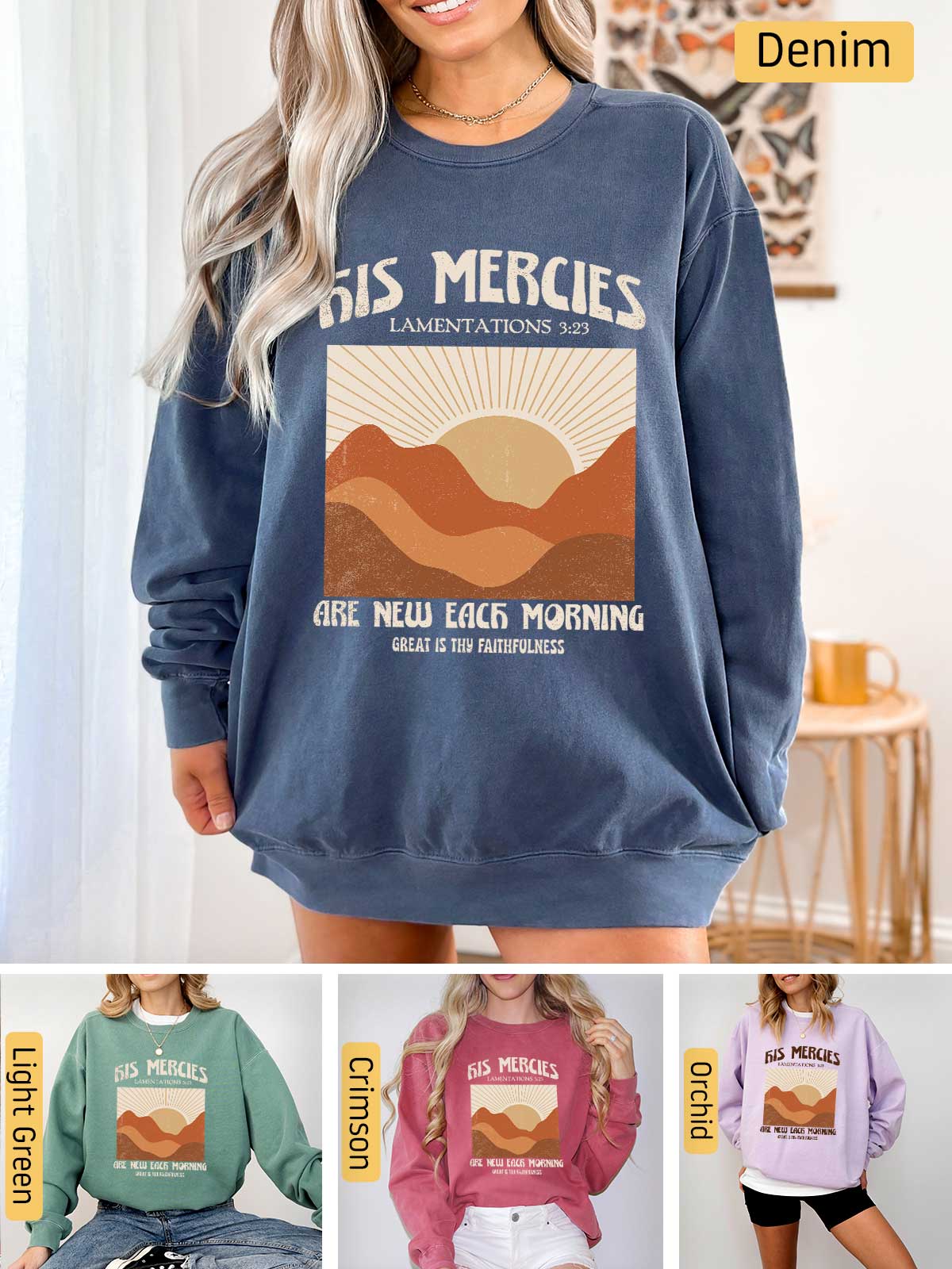 a woman wearing a sweatshirt with a mountain scene on it