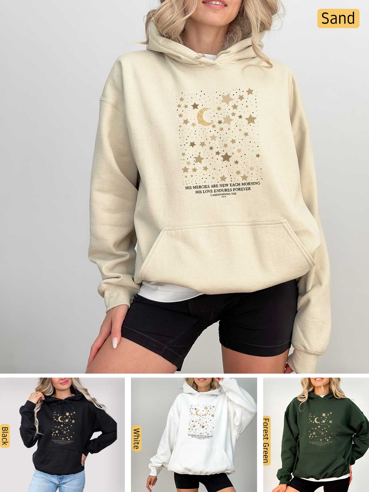 a woman wearing a sweatshirt with stars and moon on it