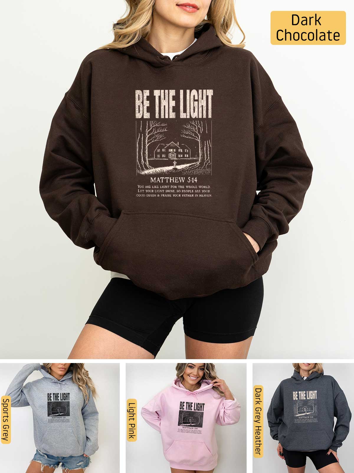 a woman wearing a hoodie with the words be the light on it