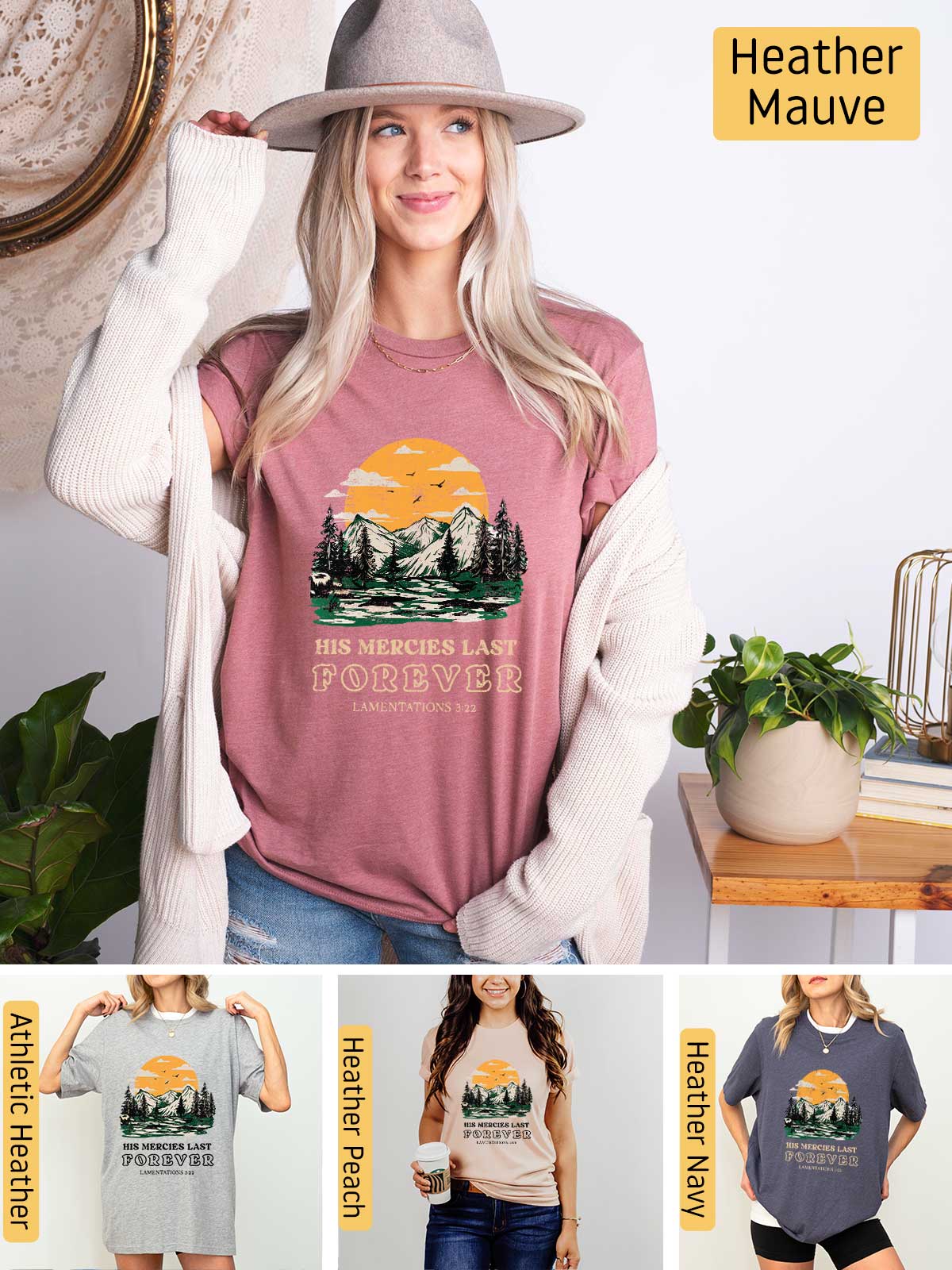 a woman wearing a t - shirt with a picture of the mountains and trees on