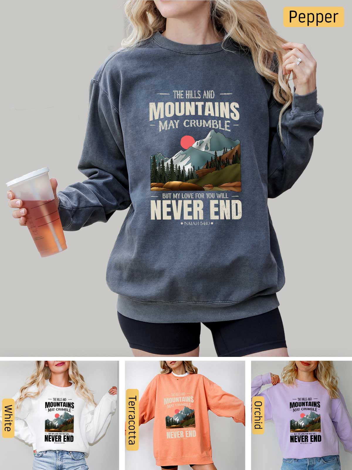 a woman wearing a sweatshirt that says the hills and mountains may crumble never end
