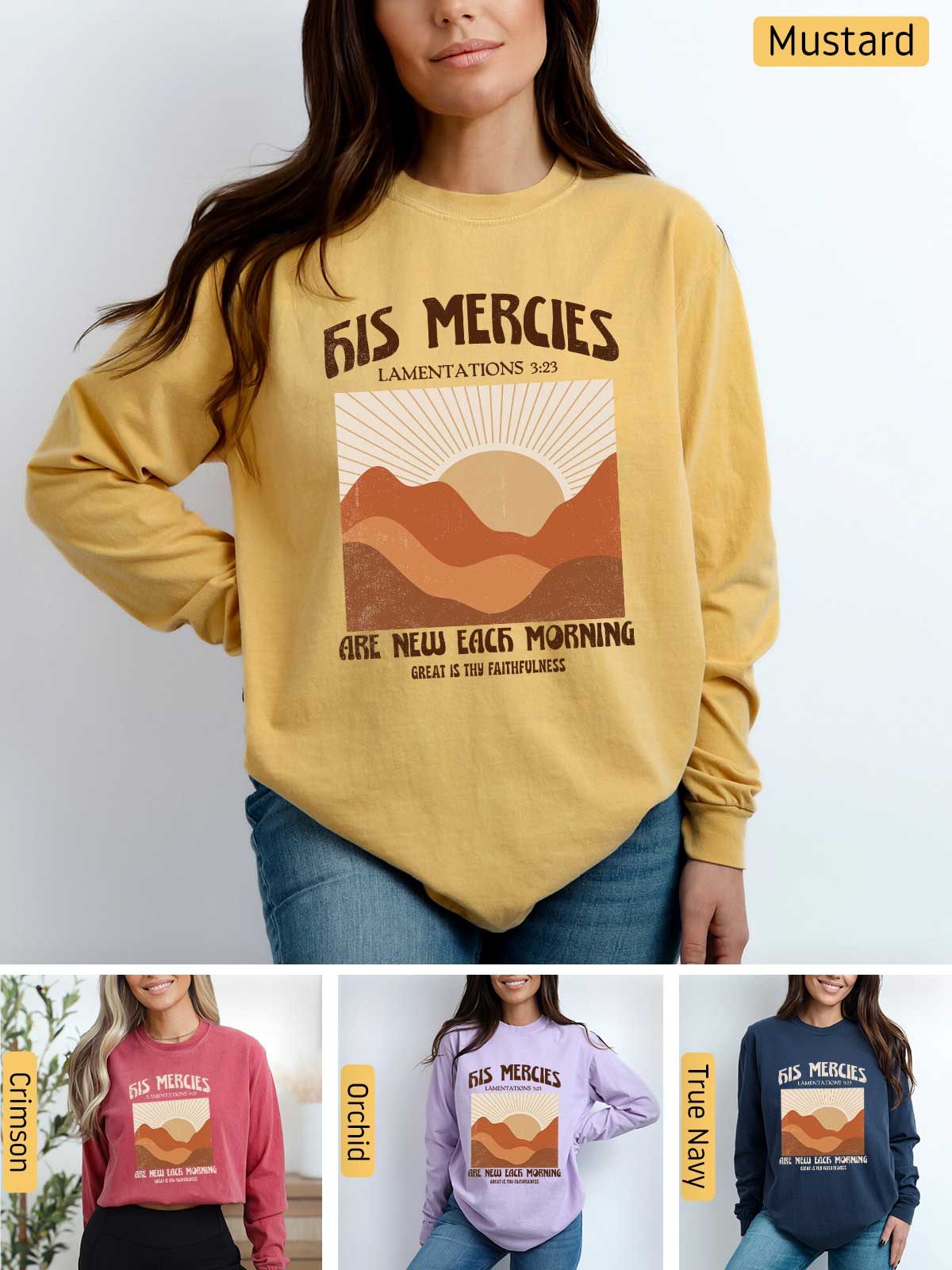 a woman wearing a mustard colored sweatshirt with a mountain scene on it