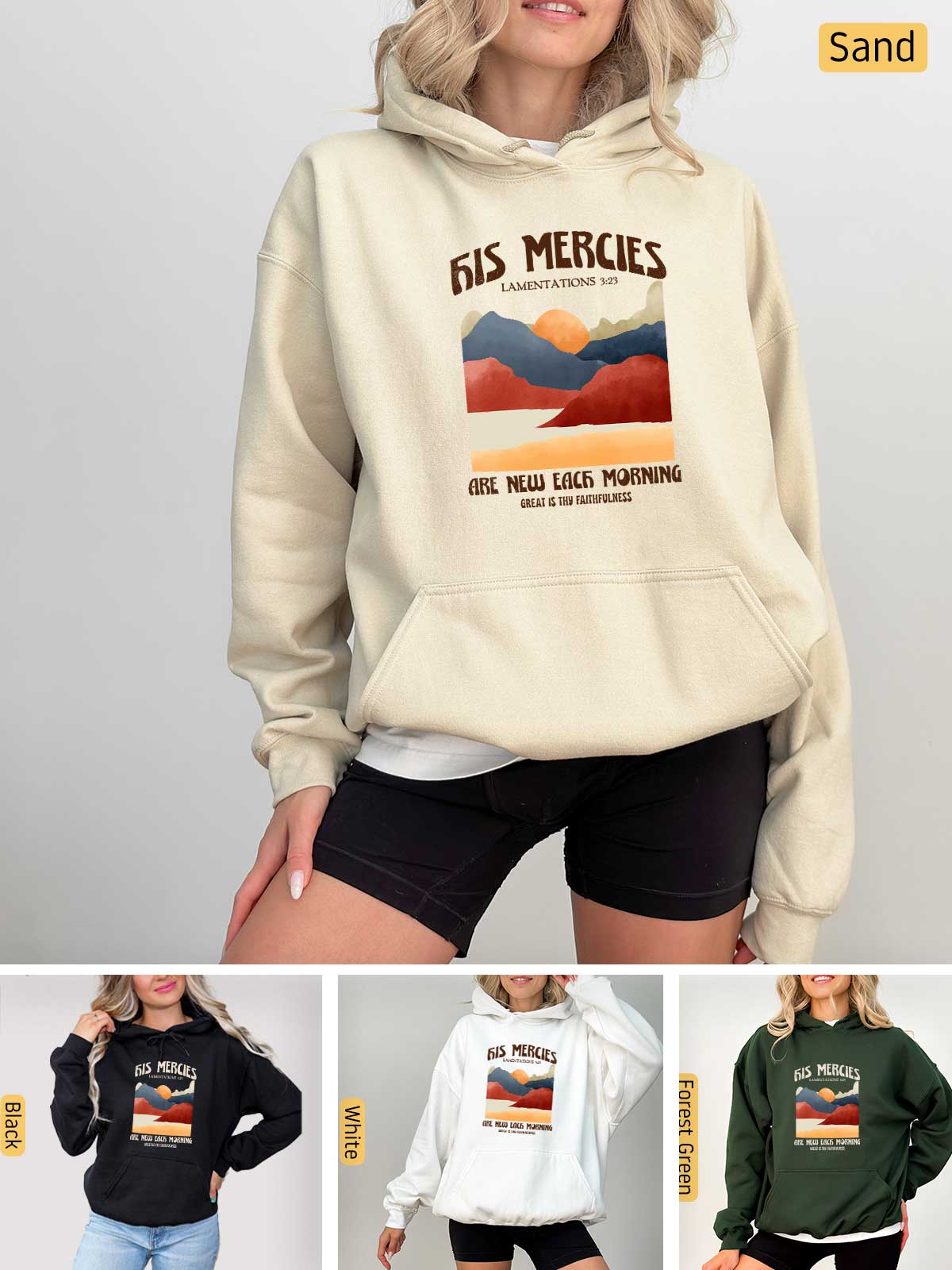 a woman wearing a sweatshirt with the words des mercies on it