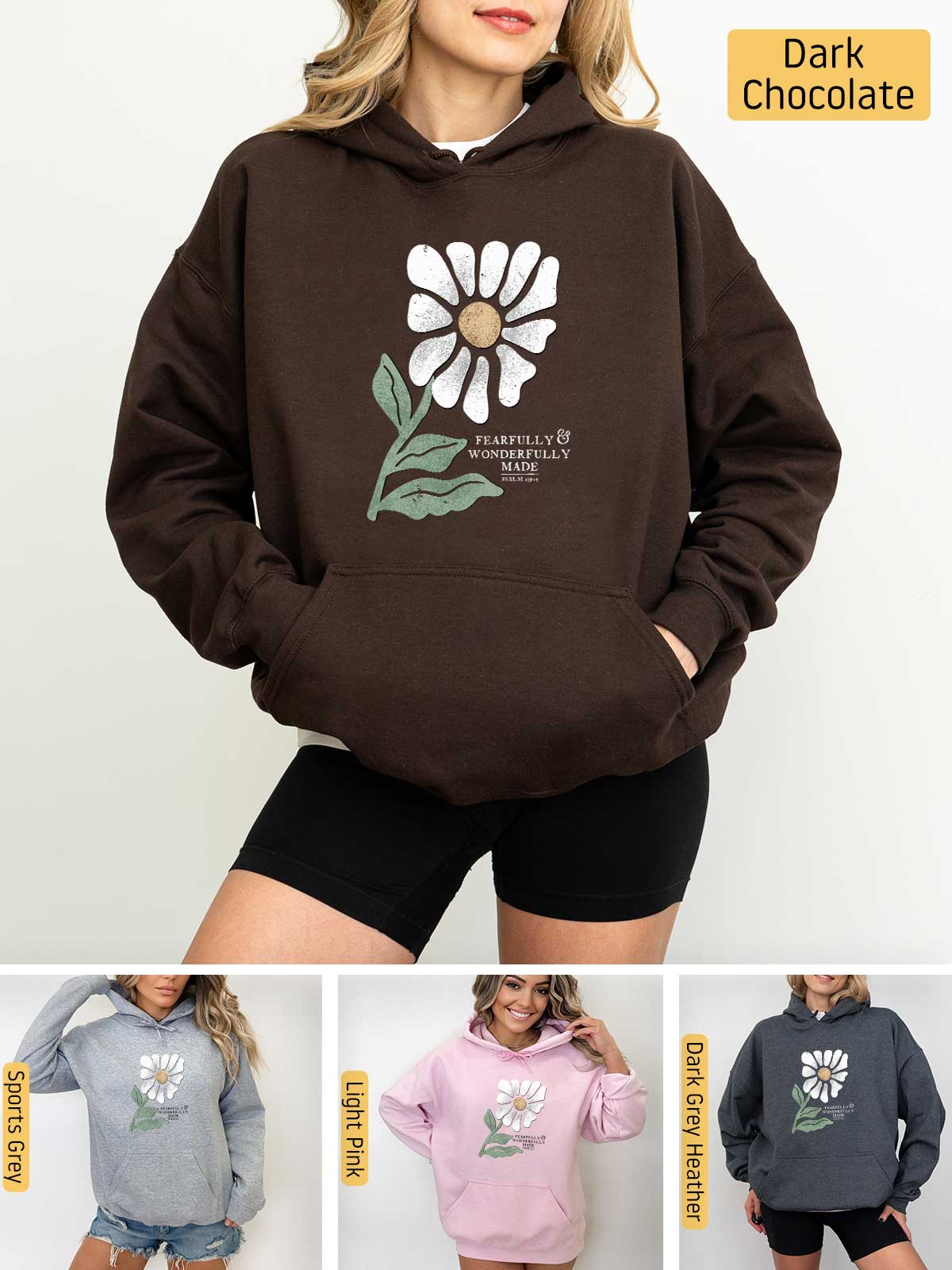 a woman wearing a hoodie with a flower on it