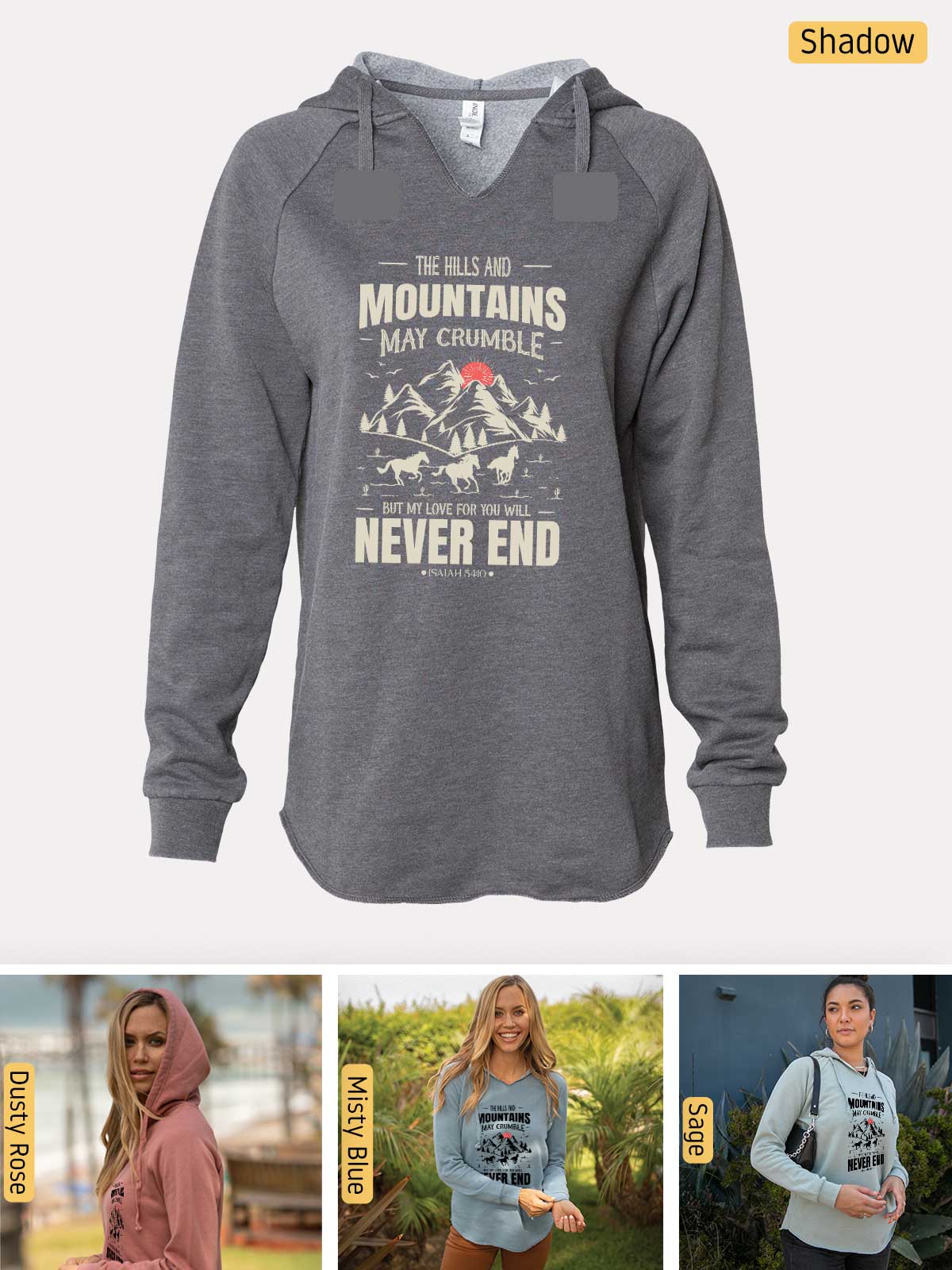 a woman wearing a sweatshirt with the words mountains may crumble never end
