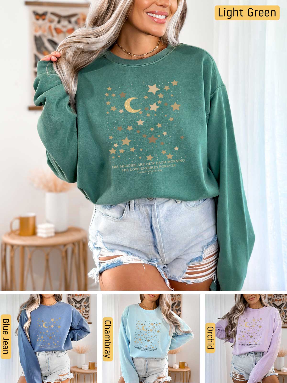 a woman wearing a green sweatshirt with stars and moon on it