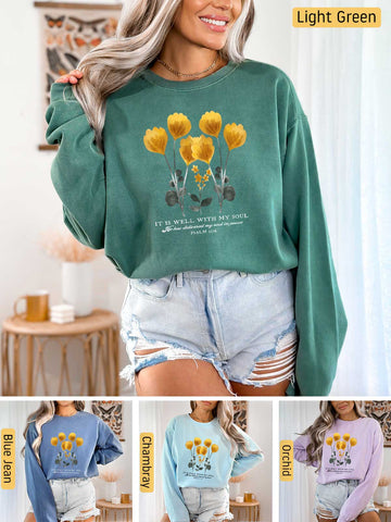 a woman wearing a green sweatshirt with yellow flowers on it
