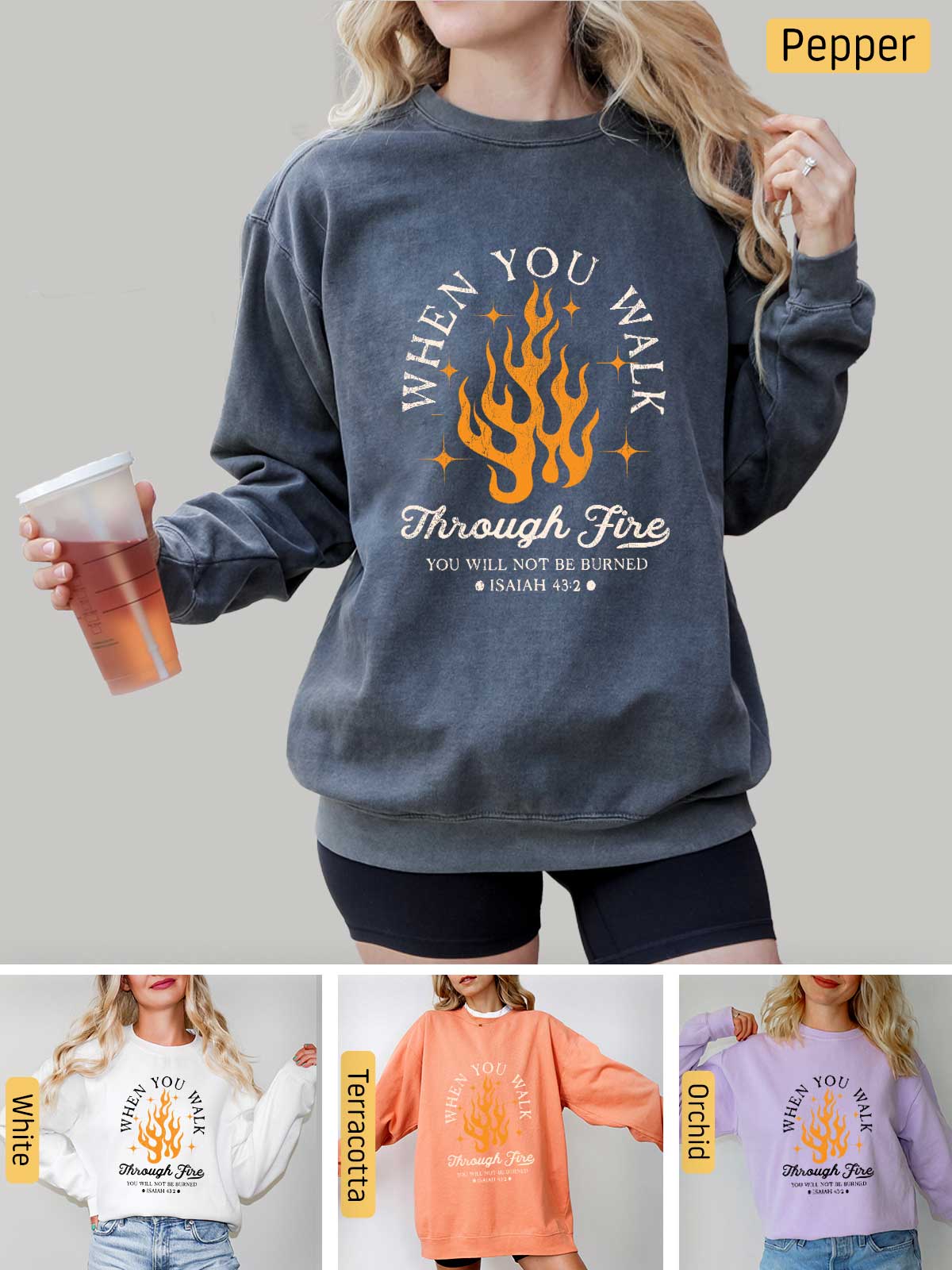 a woman wearing a sweatshirt that says when you drink through fire