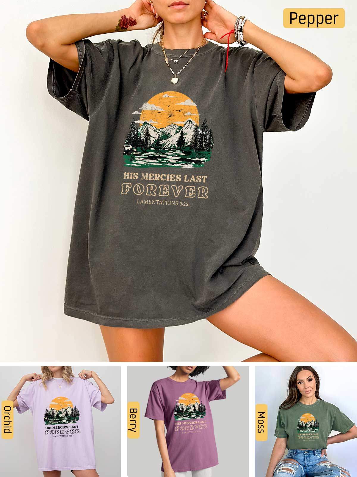 a woman wearing a t - shirt with a picture of a mountain and trees on