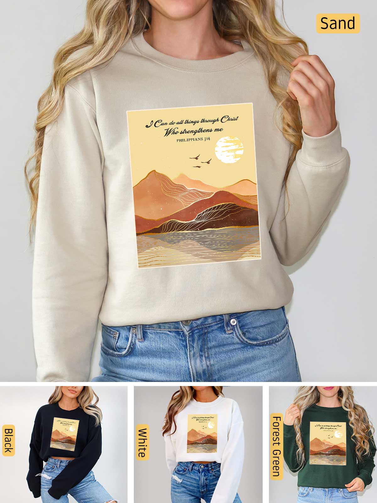 a woman wearing a sweatshirt with a picture of mountains on it