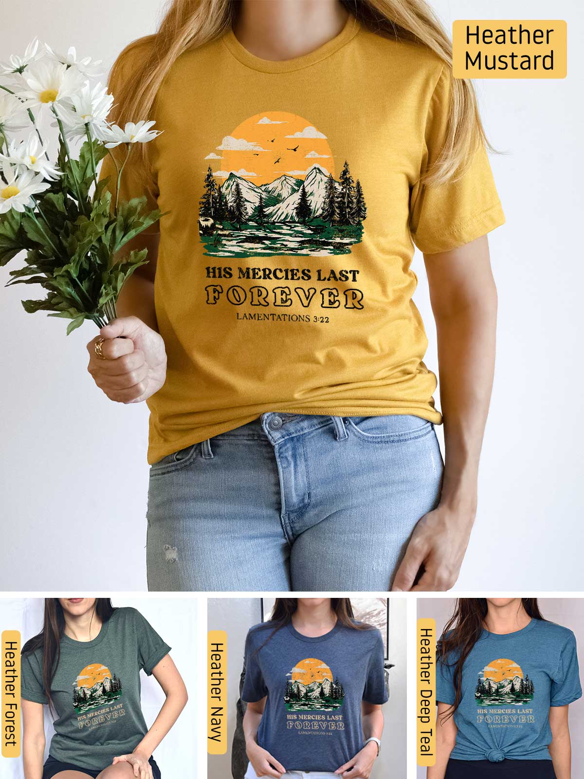 a woman wearing a t - shirt with a picture of mountains and trees on it