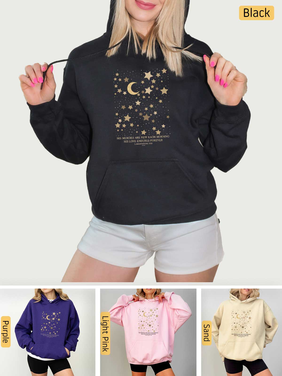 a woman wearing a hoodie with stars and moon on it