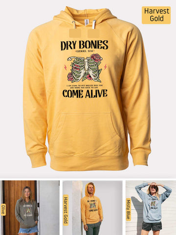 a woman wearing a yellow hoodie with a skeleton on it