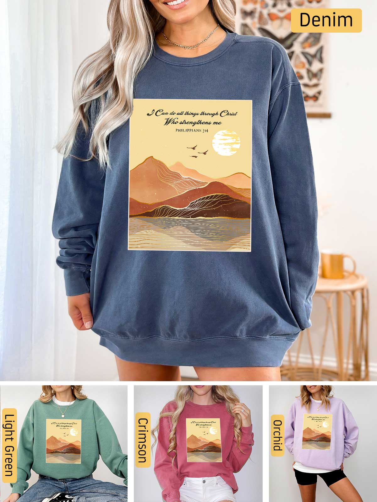 a woman wearing a sweatshirt with a picture of mountains on it