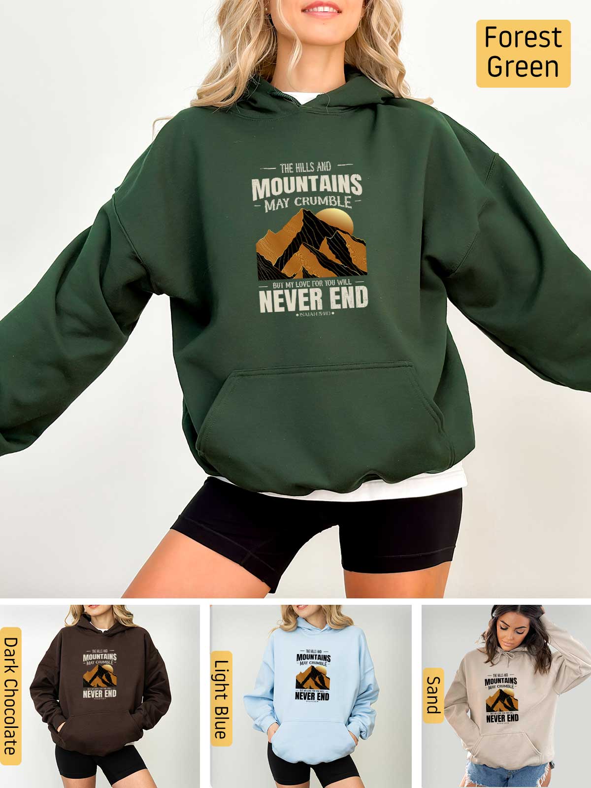 a woman wearing a hoodie that says mountains may change never end