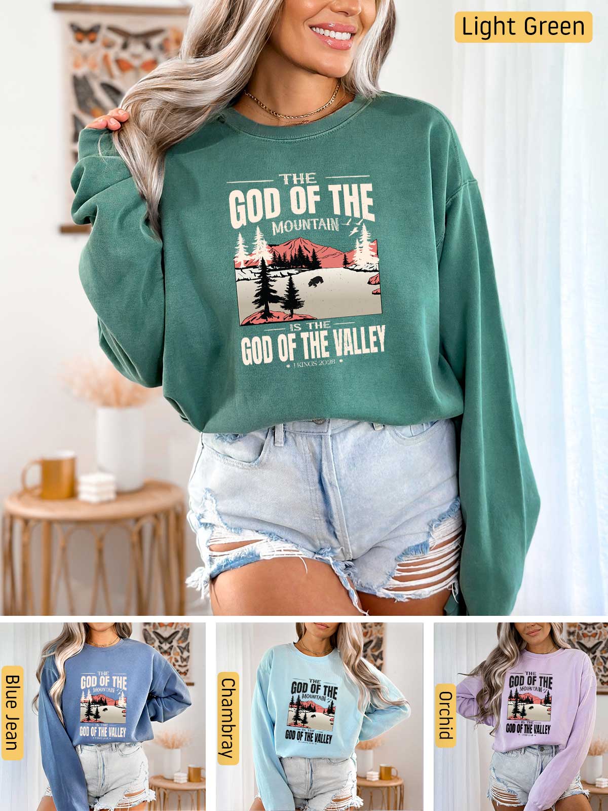 a woman wearing a green sweatshirt with the words god of the mountains on it