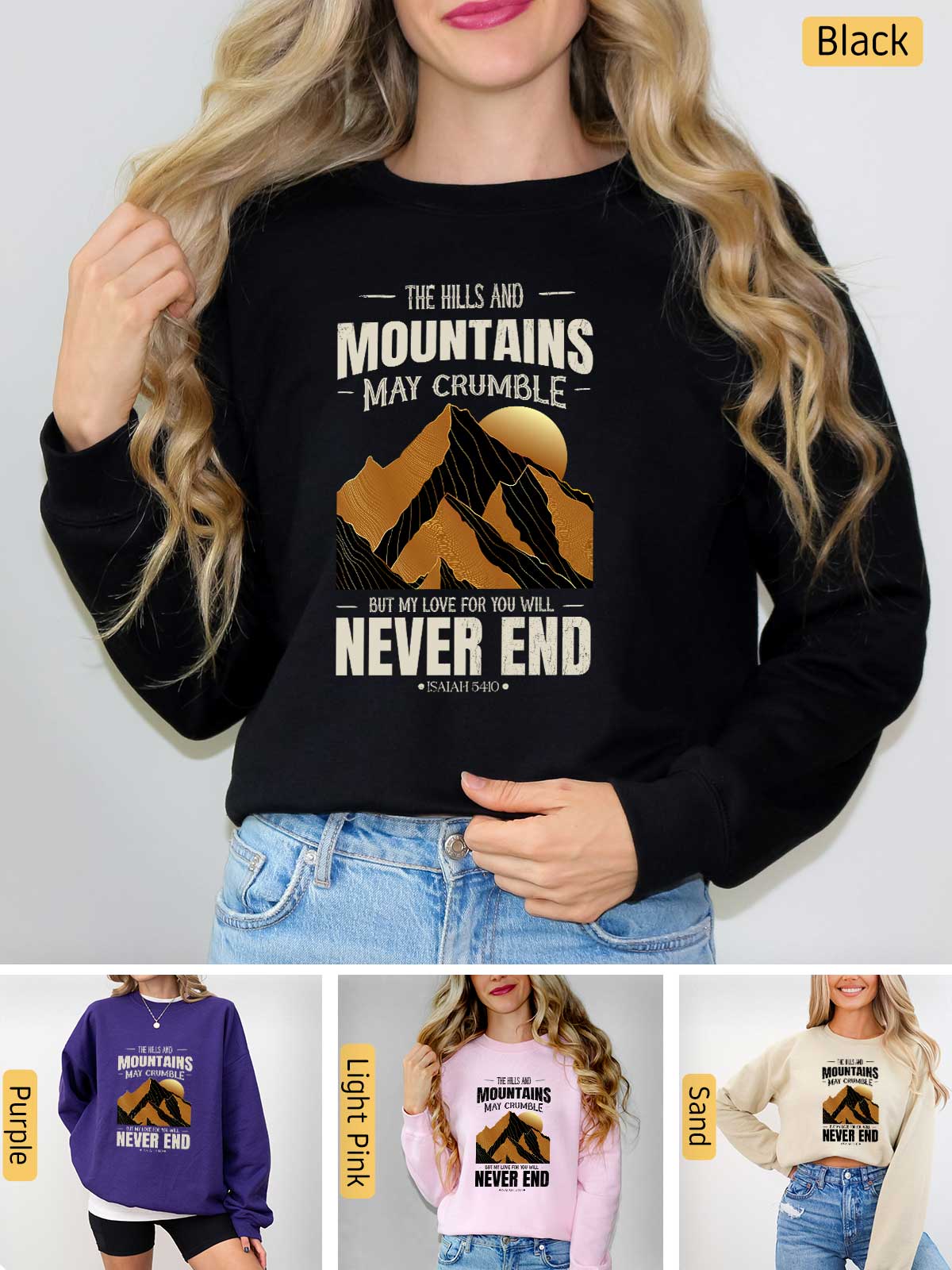a woman wearing a black sweatshirt with mountains on it