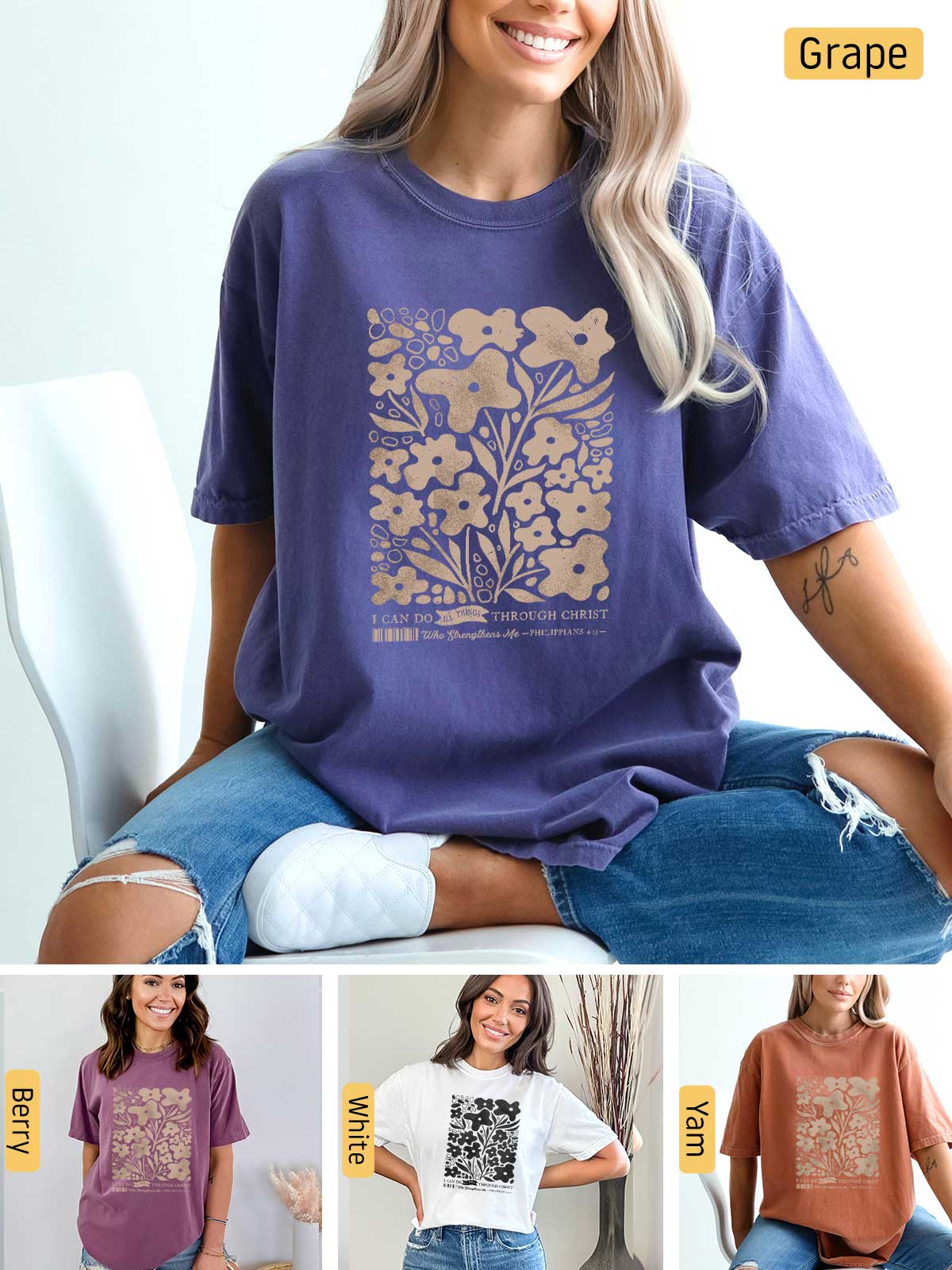 a woman sitting on a chair wearing a t - shirt with flowers on it