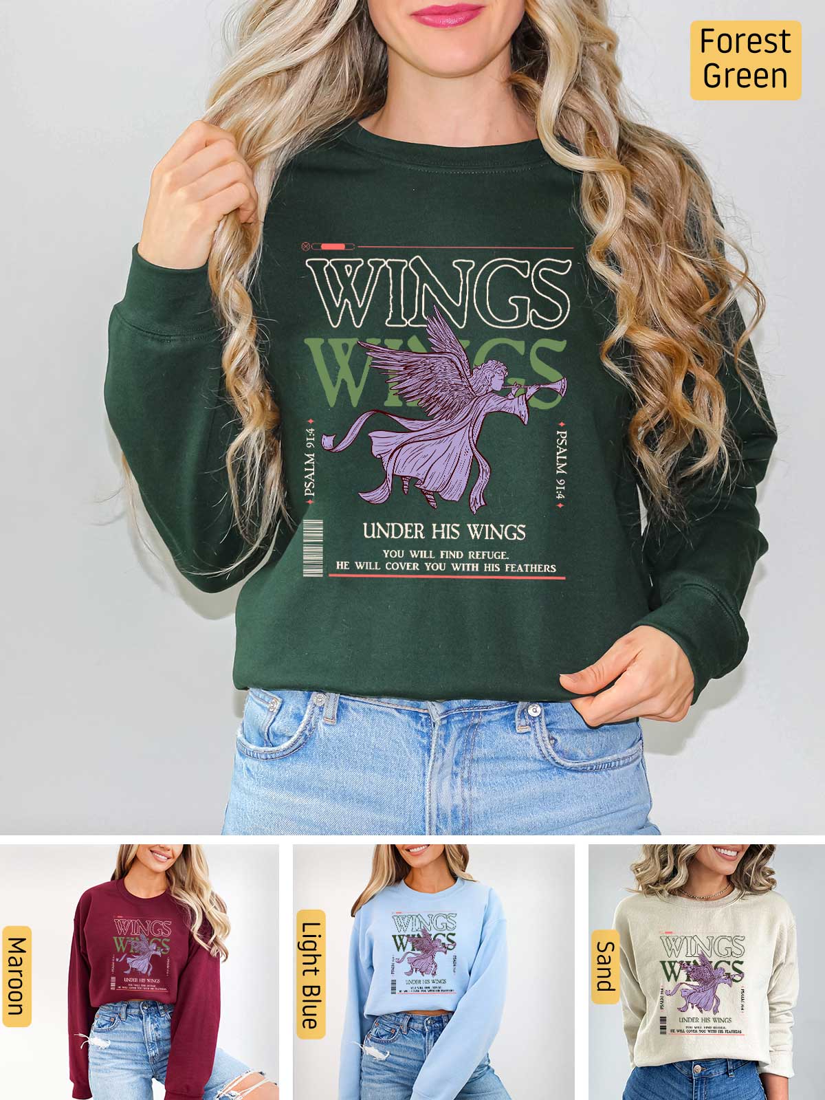 a woman wearing a sweater with wings on it