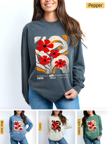 a woman wearing a sweater with flowers on it