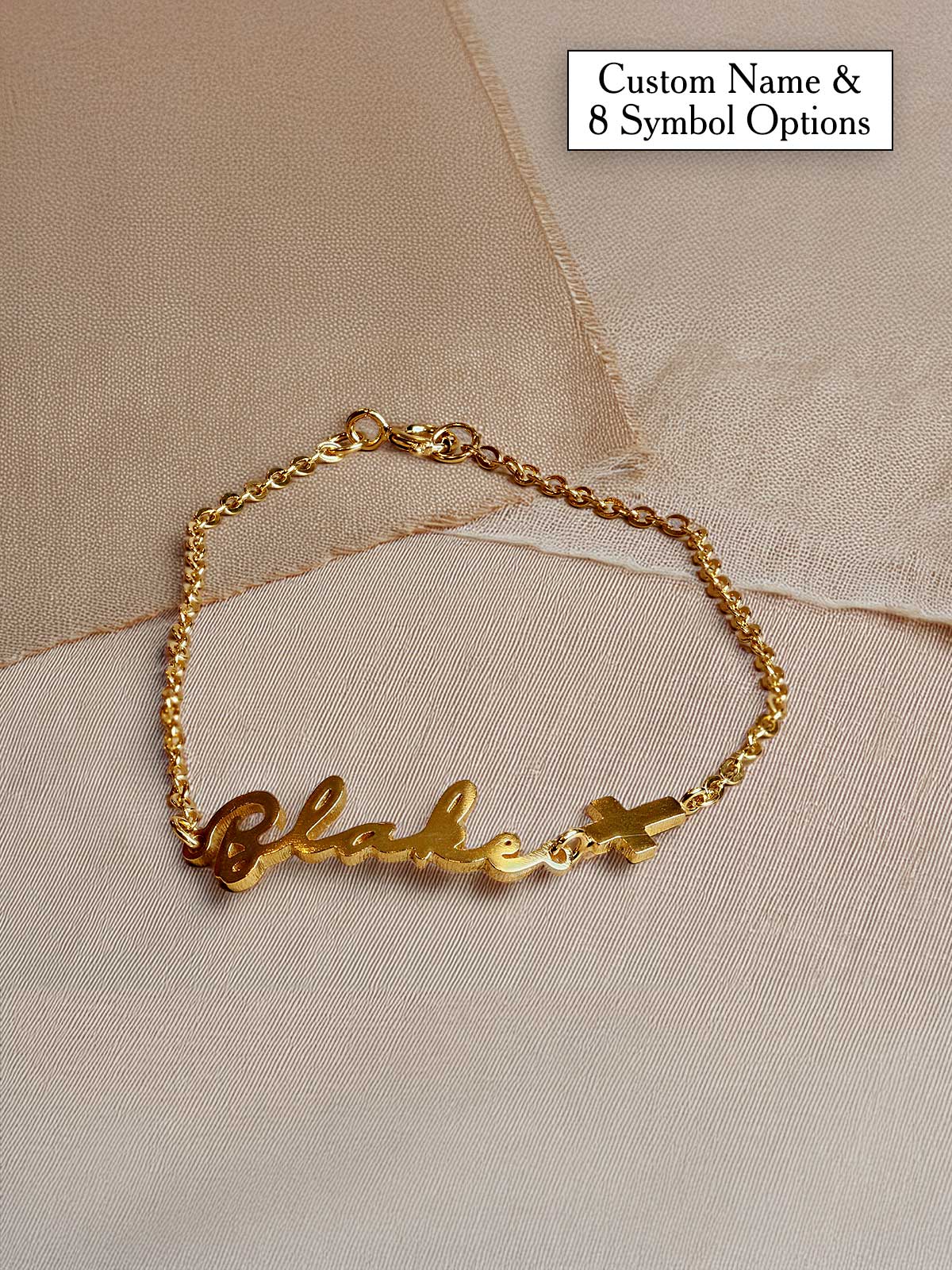 a gold bracelet with a name on it