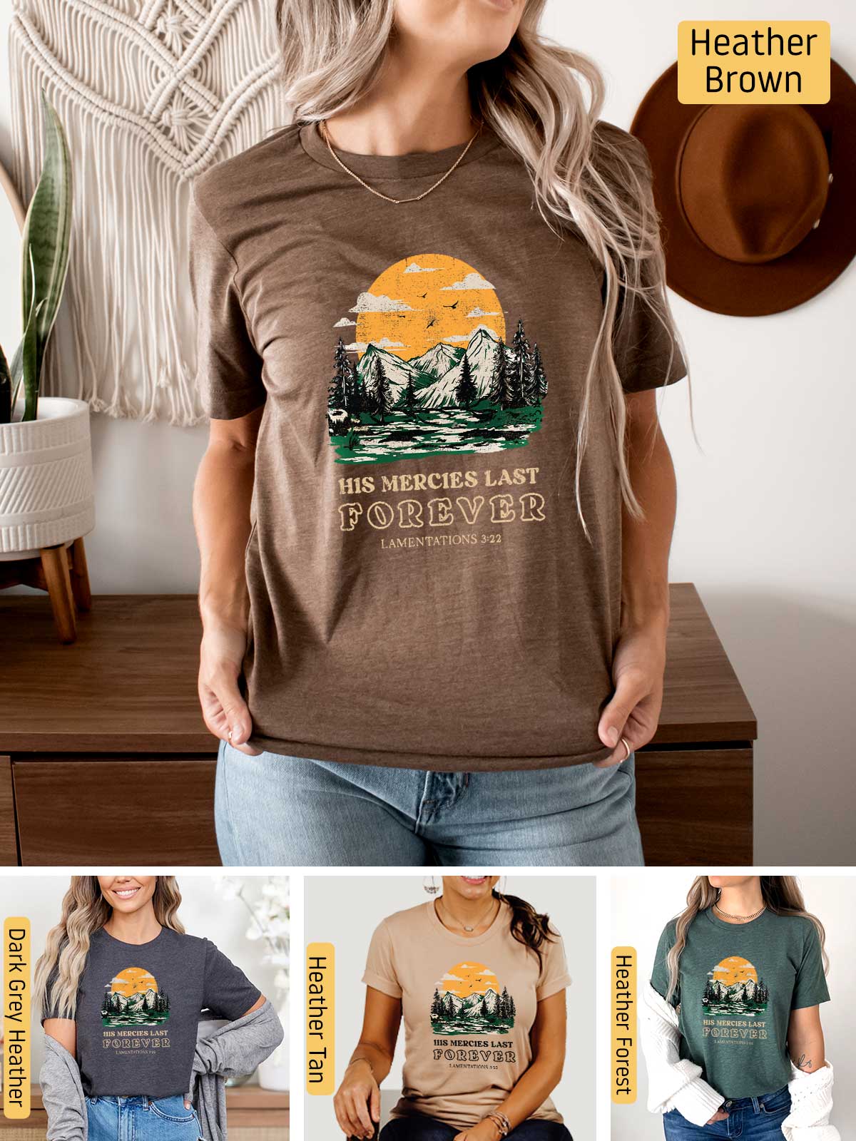 a woman wearing a brown t - shirt with a mountain scene on it