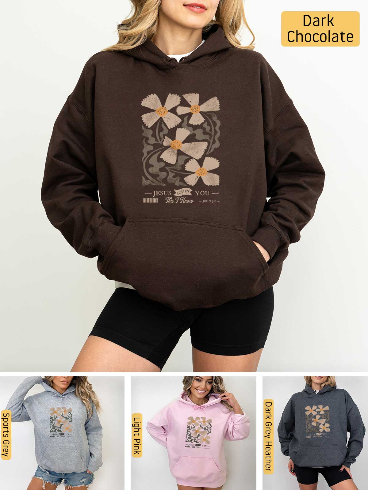 a woman wearing a brown hoodie with flowers on it