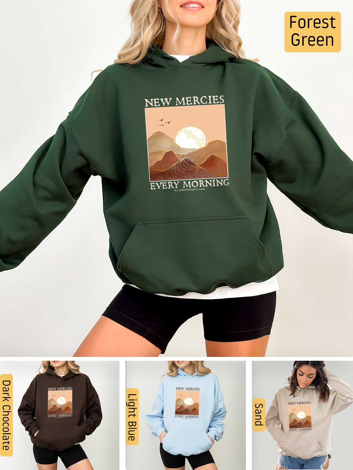 a woman wearing a new mercies sweatshirt and shorts