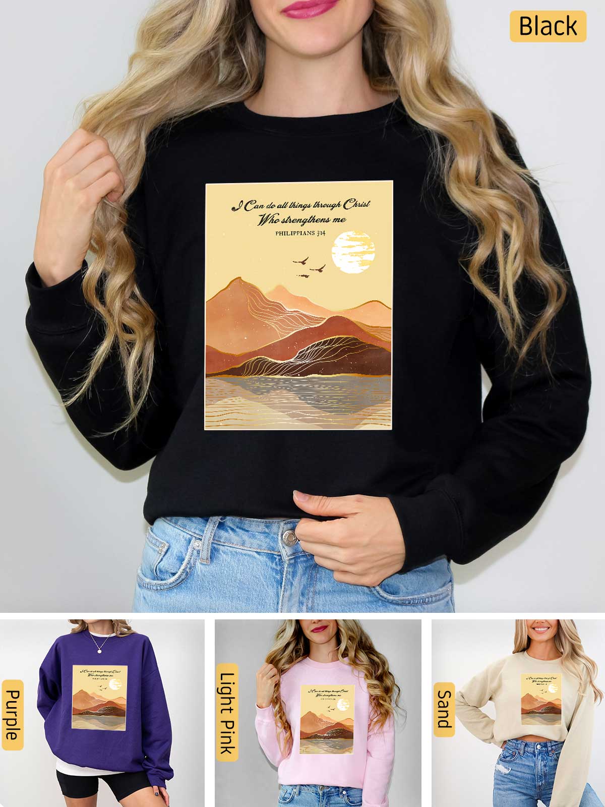 a woman wearing a black sweatshirt with a picture of mountains on it