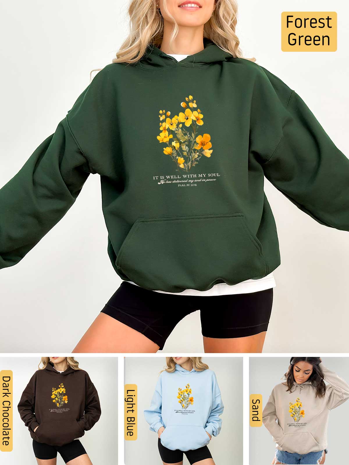 a woman wearing a green hoodie with yellow flowers on it