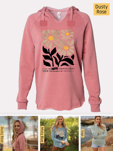 a woman wearing a pink hoodie with flowers on it