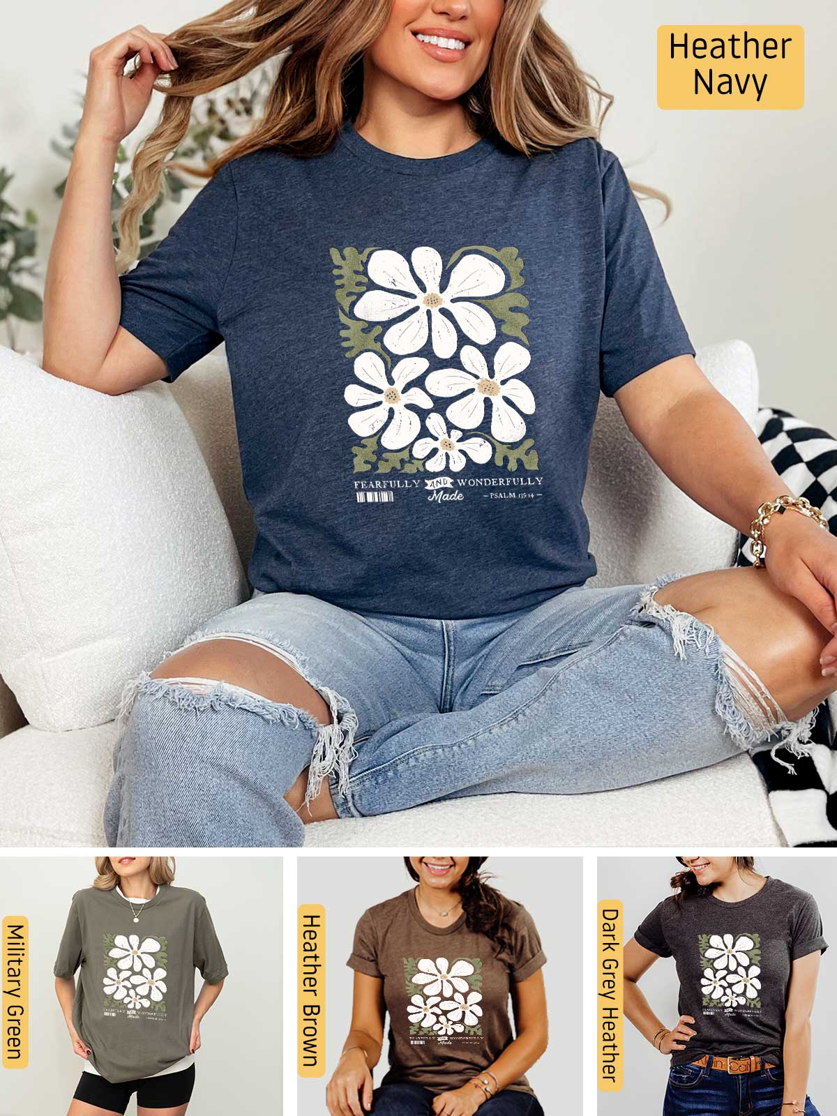a woman sitting on a couch wearing a t - shirt with flowers on it